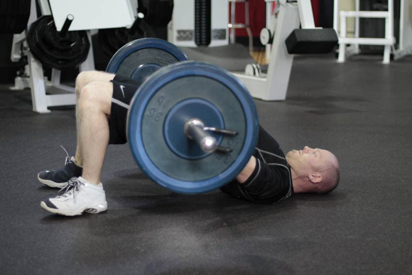 Barbell Glute Bridge — النهاية