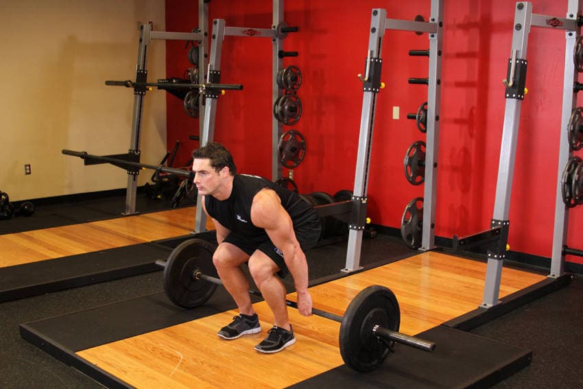 Barbell Hack Squat — البداية