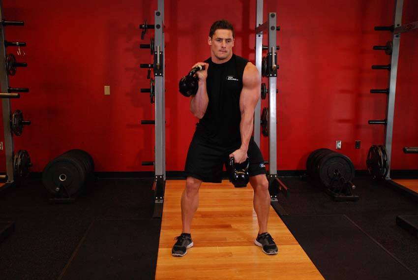 Double Kettlebell Alternating Hang Clean — النهاية
