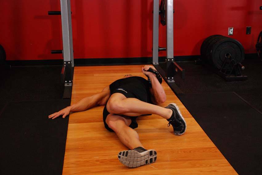 Extended Range One-Arm Kettlebell Floor Press — البداية
