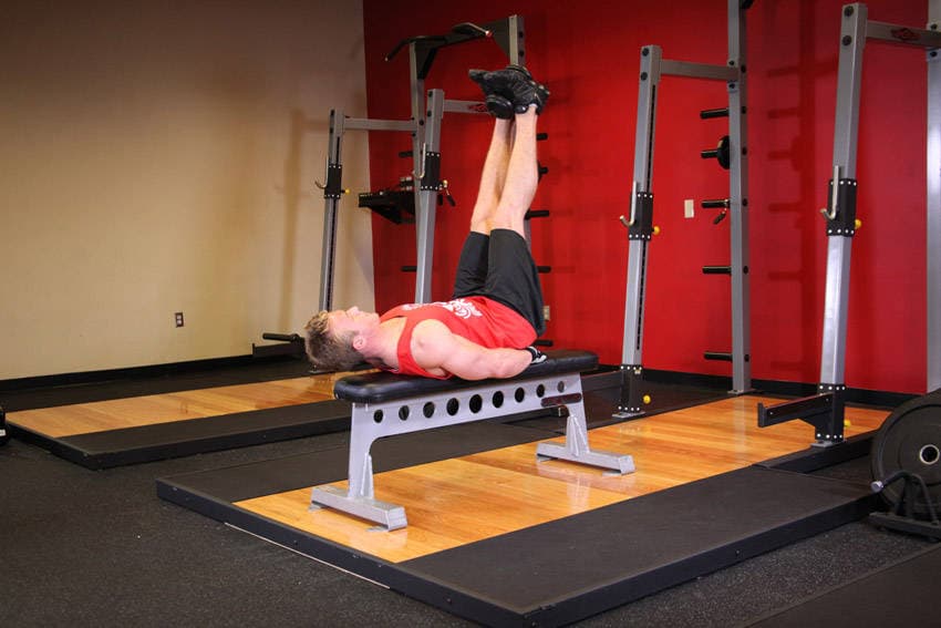 Flat Bench Lying Leg Raise — النهاية