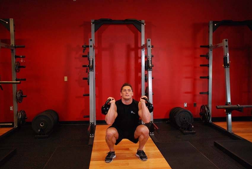 Kettlebell Thruster — النهاية