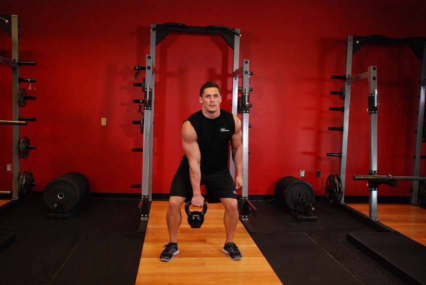 One-Arm Kettlebell Clean and Jerk — البداية
