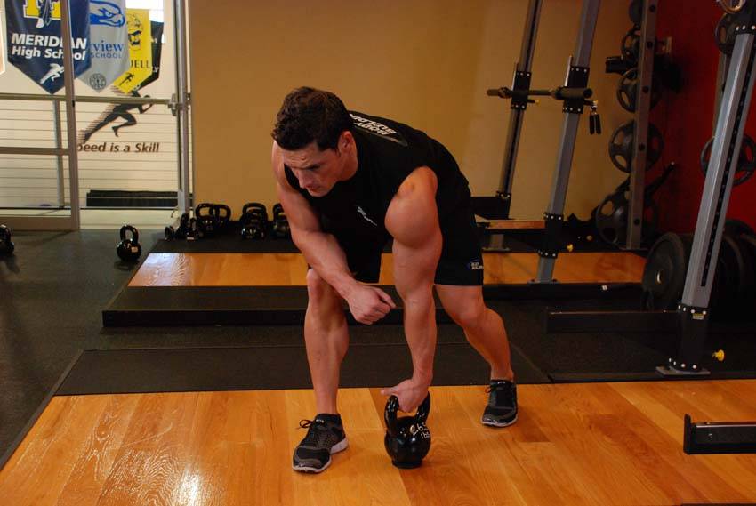 One-Arm Kettlebell Row — البداية