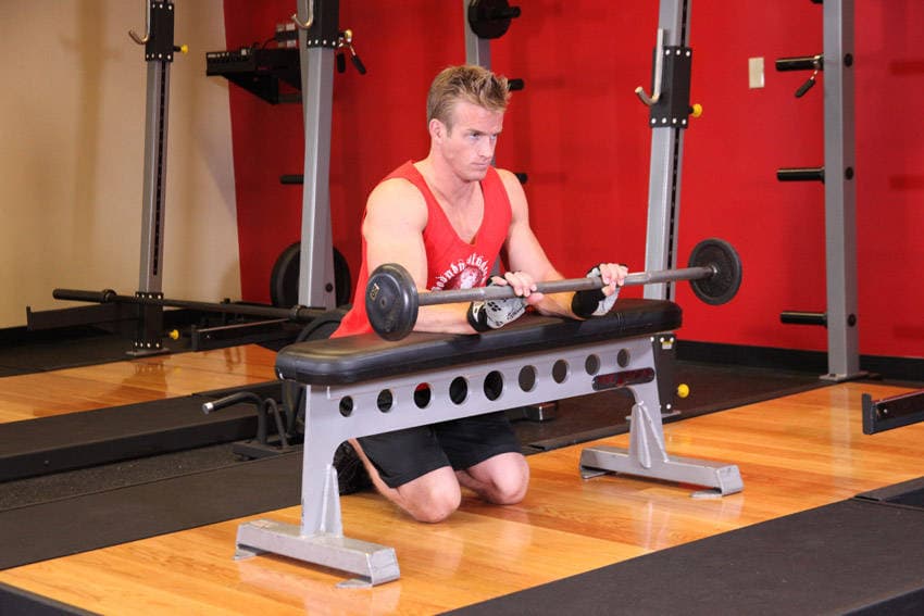 Palms-Down Wrist Curl Over A Bench — النهاية