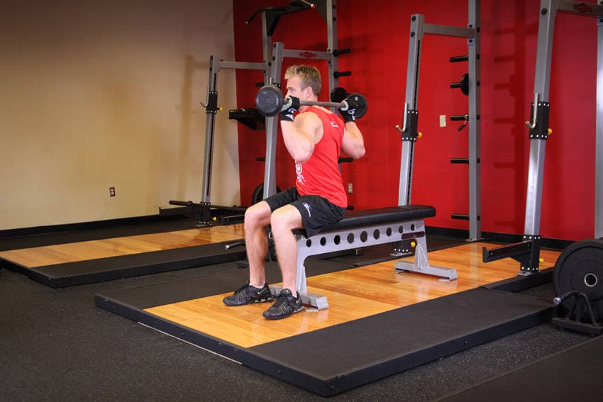 Seated Barbell Twist — البداية