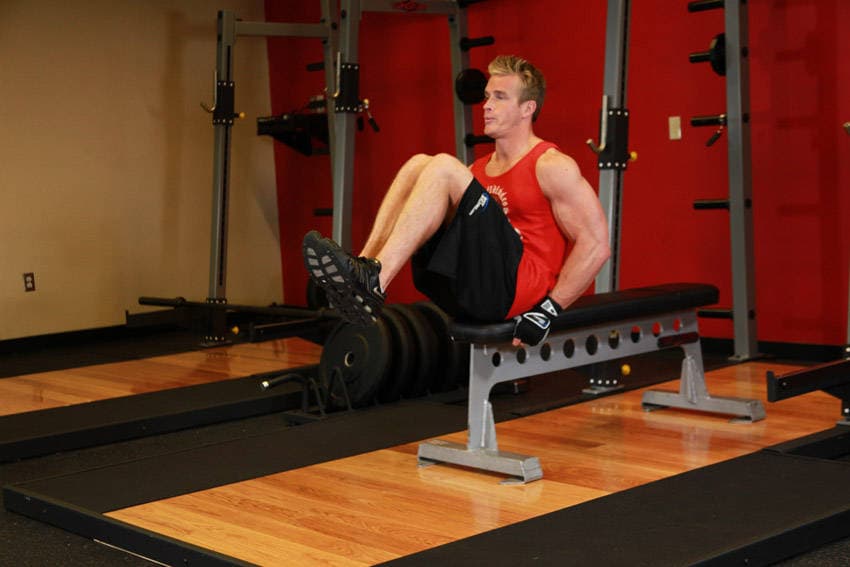 Seated Flat Bench Leg Pull-In — النهاية