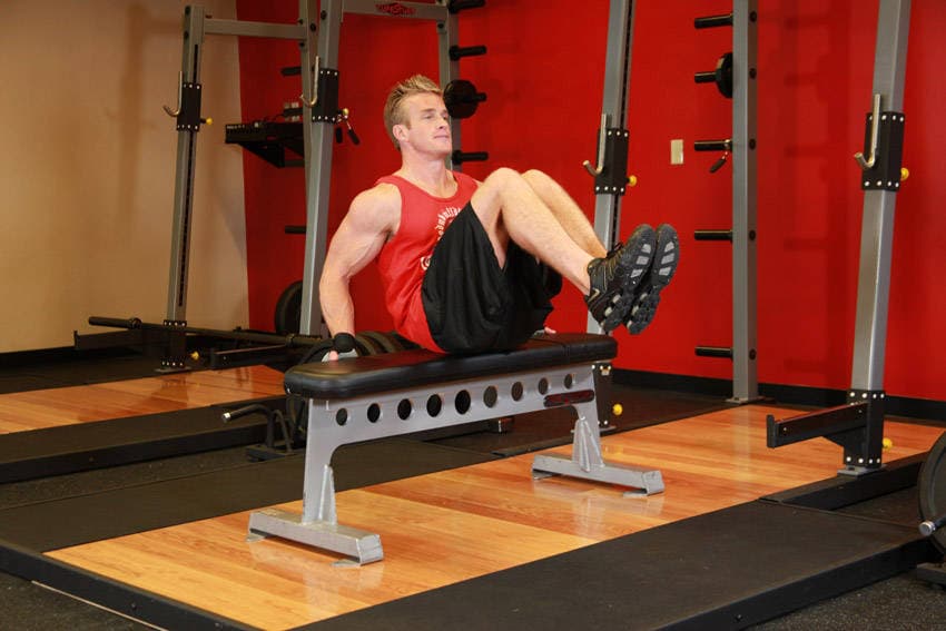 Seated Leg Tucks — البداية