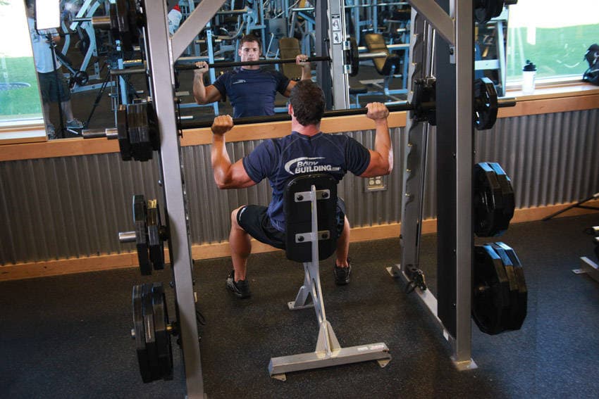 Smith Machine Overhead Shoulder Press — البداية