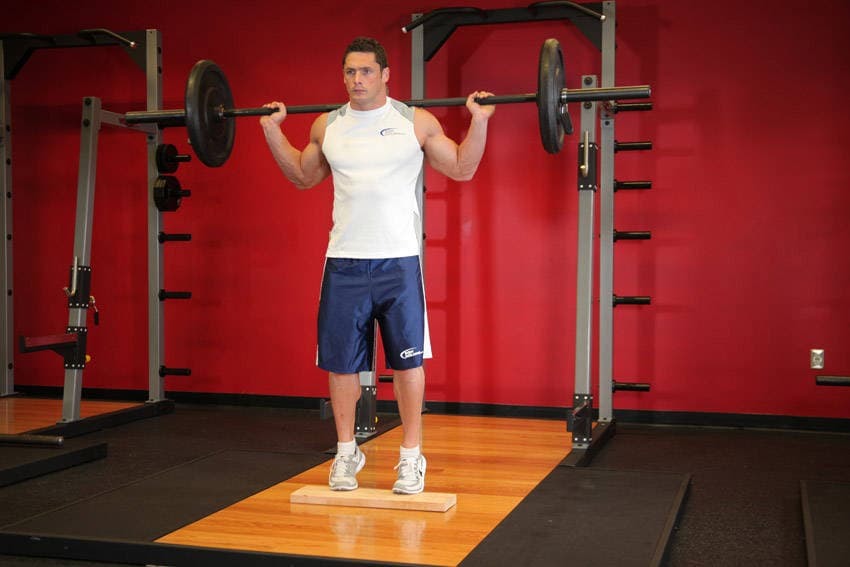 Standing Barbell Calf Raise — البداية