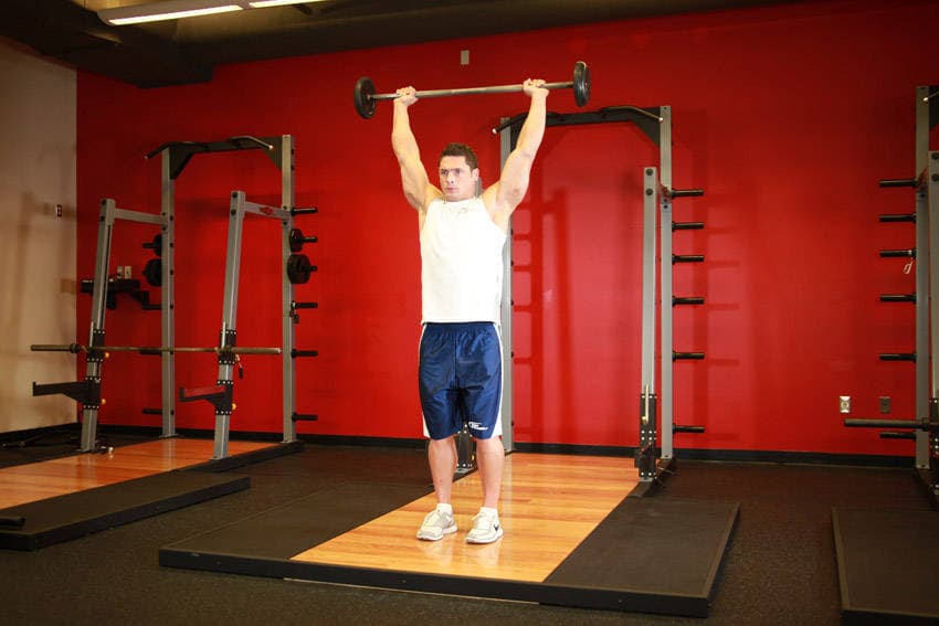 Standing Barbell Press Behind Neck — النهاية