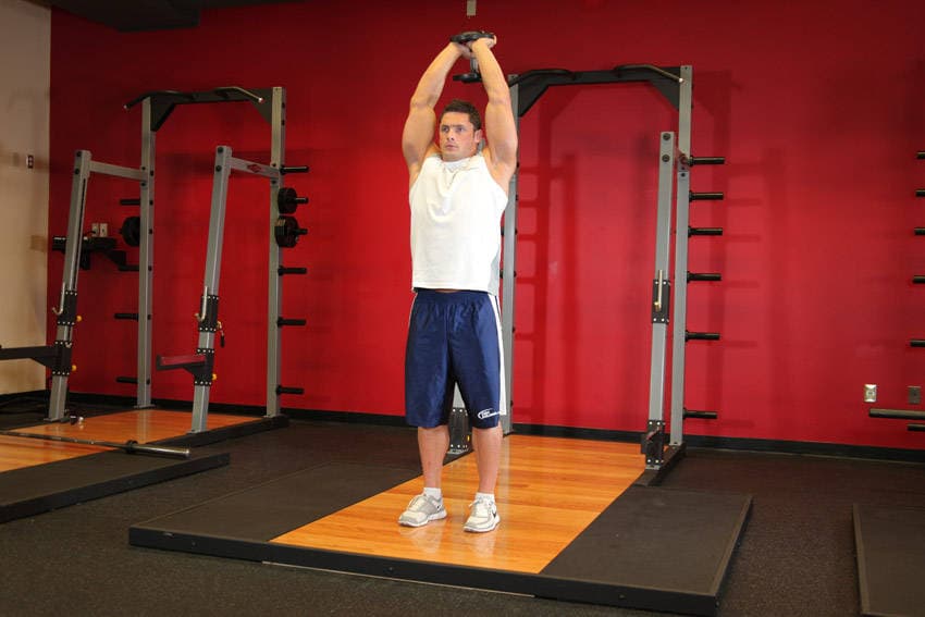 Standing Dumbbell Triceps Extension — البداية
