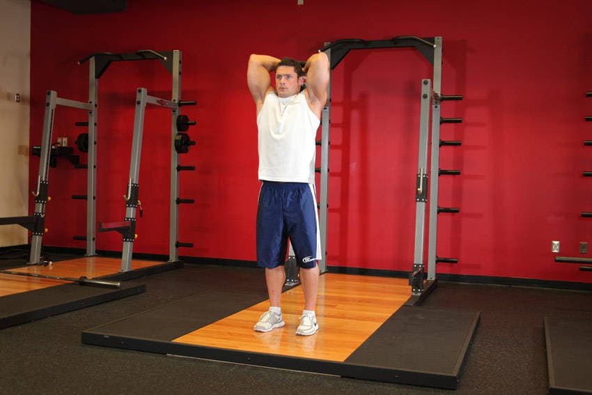 Standing Dumbbell Triceps Extension — النهاية