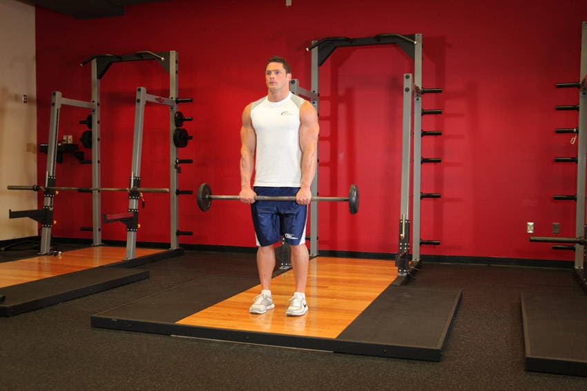 Standing Front Barbell Raise Over Head — البداية