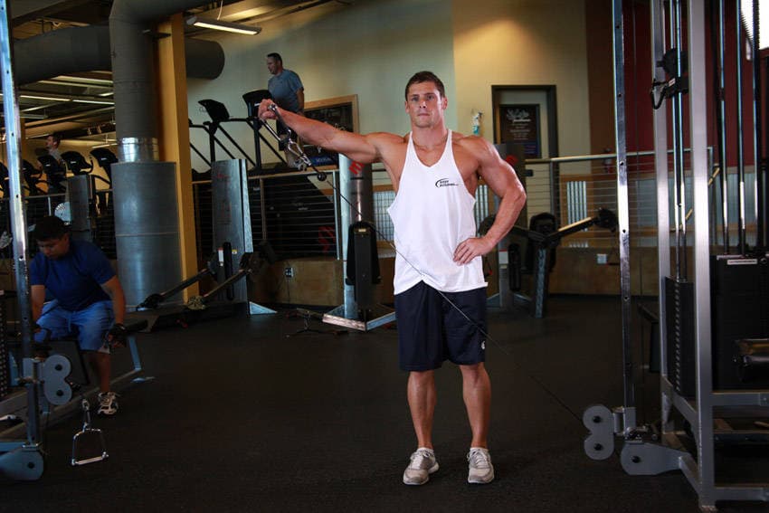 Standing Low-Pulley Deltoid Raise — البداية