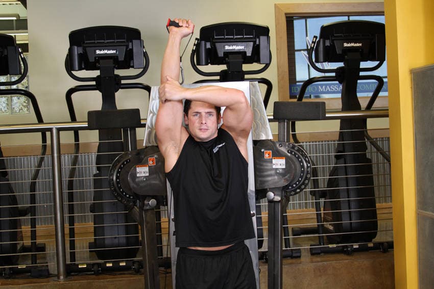Standing Low-Pulley One-Arm Triceps Extension — النهاية