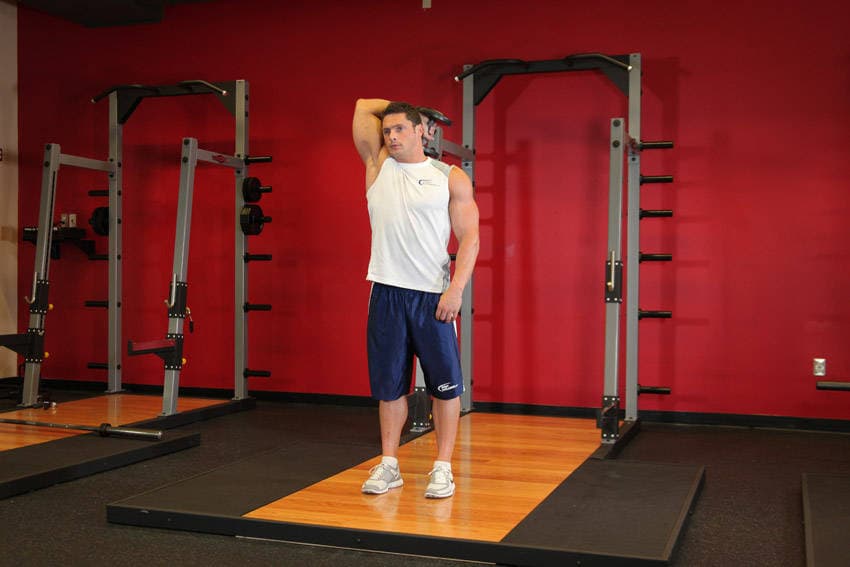 Standing One-Arm Dumbbell Triceps Extension — النهاية