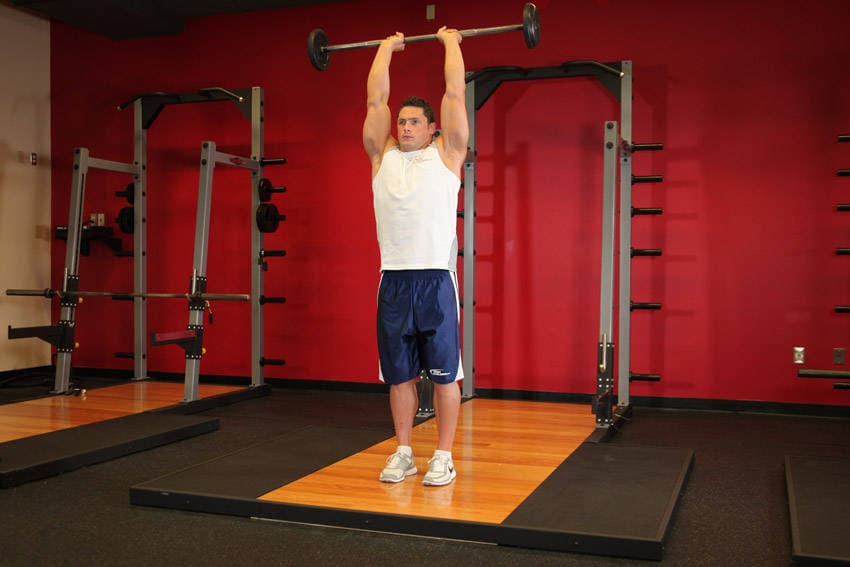 Standing Overhead Barbell Triceps Extension — النهاية