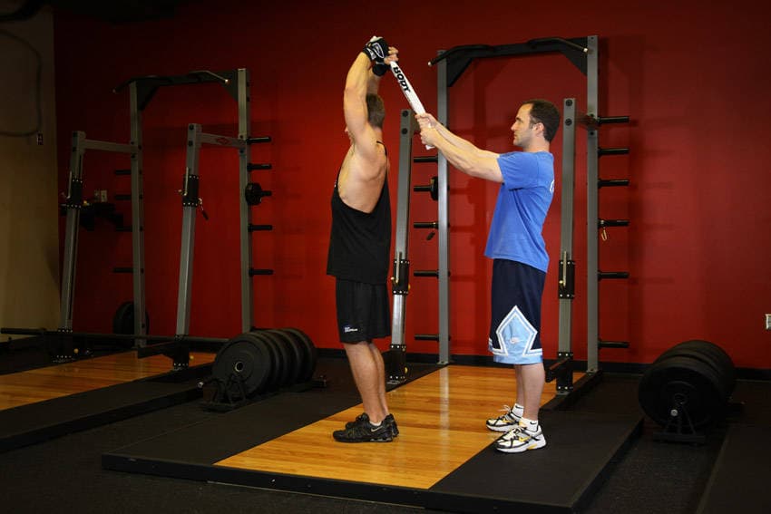 Standing Towel Triceps Extension — النهاية