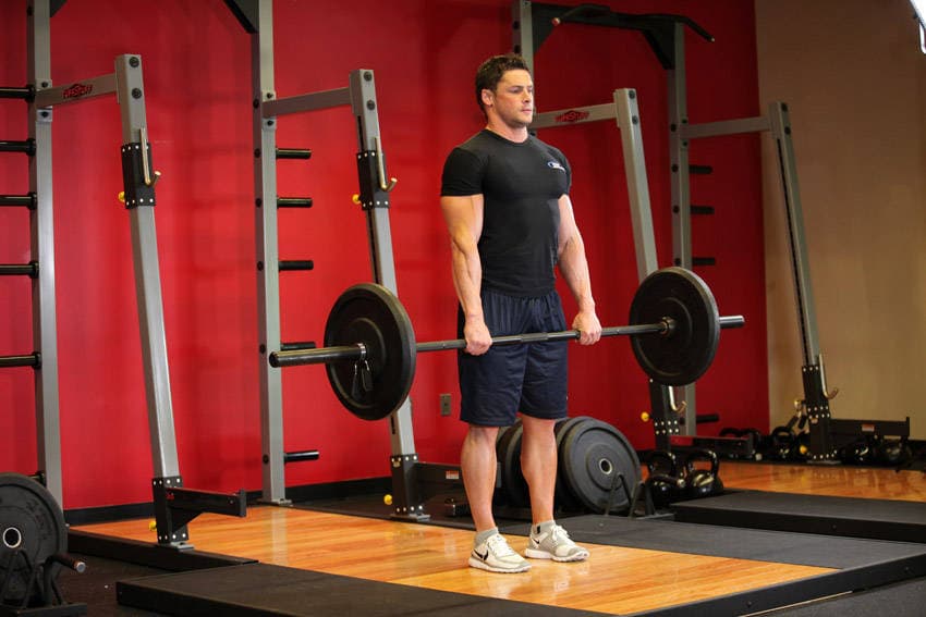 Stiff-Legged Barbell Deadlift — النهاية
