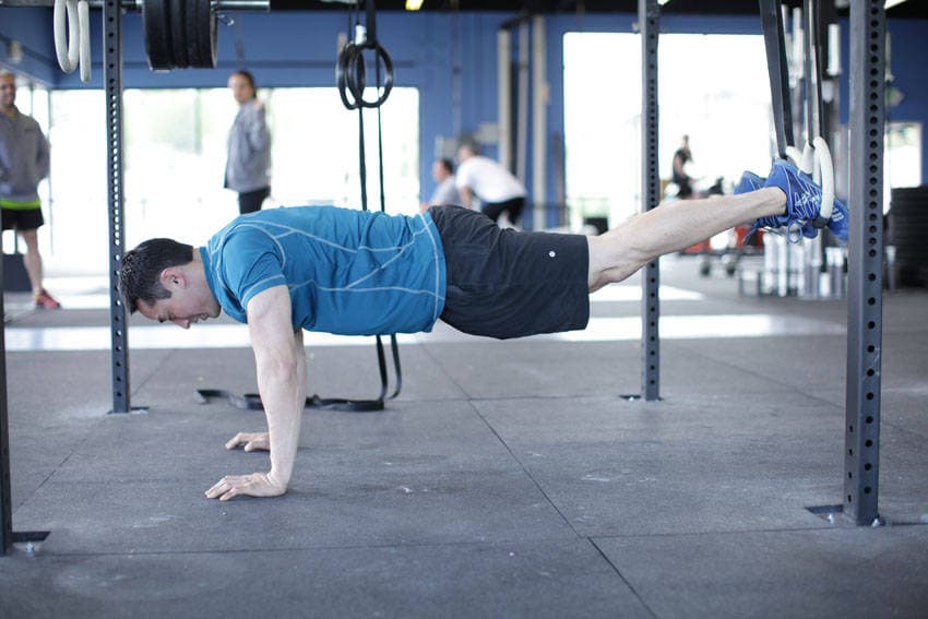 Suspended Reverse Crunch — البداية