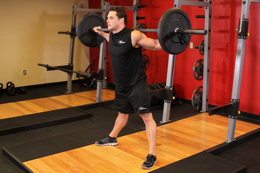 Wide Stance Barbell Squat — البداية