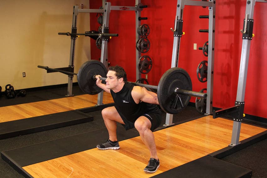 Wide Stance Barbell Squat — النهاية
